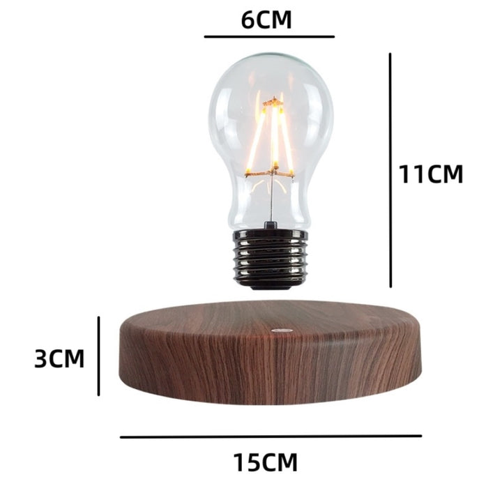 Measured drawing showing a 15 cm base and an 11 cm bulb